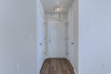 Fantastic opportunity to own this spacious first-floor end-unit on International Club of Myrtle Beach in South Carolina - for sale on GolfHomes.com, golf home, golf lot