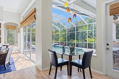 Step into a stunning, light-filled residence where elegance on University Park Country Club in Florida - for sale on GolfHomes.com, golf home, golf lot