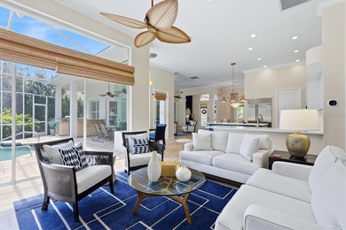 Step into a stunning, light-filled residence where elegance on University Park Country Club in Florida - for sale on GolfHomes.com, golf home, golf lot