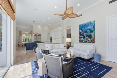 Step into a stunning, light-filled residence where elegance on University Park Country Club in Florida - for sale on GolfHomes.com, golf home, golf lot