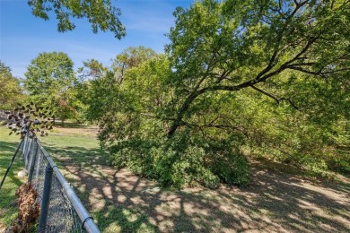 Charming two-story traditional on a deep lot, backing up to on Mesquite Municipal Golf Course in Texas - for sale on GolfHomes.com, golf home, golf lot