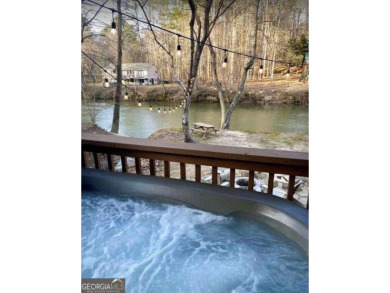 Riverfront living at itCOs finest with 110 feet of river on White Path Golf Club in Georgia - for sale on GolfHomes.com, golf home, golf lot