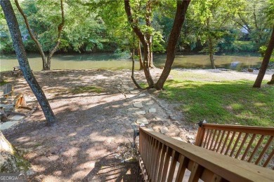 Riverfront living at itCOs finest with 110 feet of river on White Path Golf Club in Georgia - for sale on GolfHomes.com, golf home, golf lot