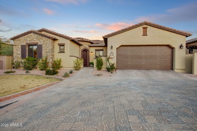 Built in 2022, this exceptional Bellago residence is located on Superstition Mountain Club - Lost Gold in Arizona - for sale on GolfHomes.com, golf home, golf lot
