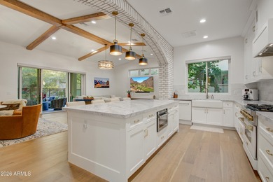 Built in 2022, this exceptional Bellago residence is located on Superstition Mountain Club - Lost Gold in Arizona - for sale on GolfHomes.com, golf home, golf lot