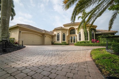 Welcome to your dream home in Weston Hills! This recently on Weston Hills Country Club in Florida - for sale on GolfHomes.com, golf home, golf lot