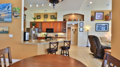 Discover the Florida lifestyle in this pool home-offered on Plantation Bay Golf and Country Club in Florida - for sale on GolfHomes.com, golf home, golf lot