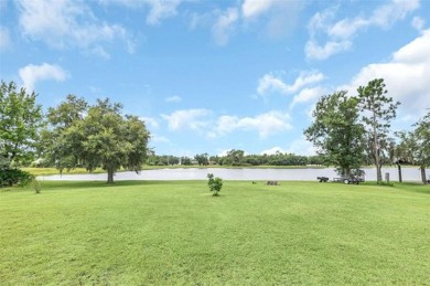 Stunning Lakefront Estate Home!!  With a 3-way split floorplan on Wedgefield Golf Club in Florida - for sale on GolfHomes.com, golf home, golf lot