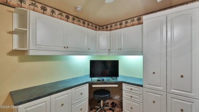Discover the Florida lifestyle in this pool home-offered on Plantation Bay Golf and Country Club in Florida - for sale on GolfHomes.com, golf home, golf lot