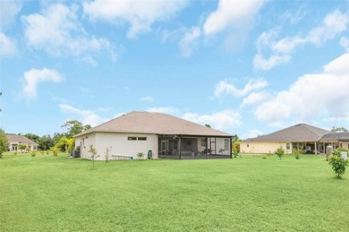 Stunning Lakefront Estate Home!!  With a 3-way split floorplan on Wedgefield Golf Club in Florida - for sale on GolfHomes.com, golf home, golf lot