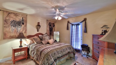 Discover the Florida lifestyle in this pool home-offered on Plantation Bay Golf and Country Club in Florida - for sale on GolfHomes.com, golf home, golf lot