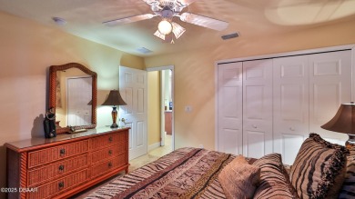 Discover the Florida lifestyle in this pool home-offered on Plantation Bay Golf and Country Club in Florida - for sale on GolfHomes.com, golf home, golf lot