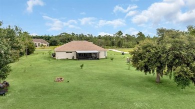 Stunning Lakefront Estate Home!!  With a 3-way split floorplan on Wedgefield Golf Club in Florida - for sale on GolfHomes.com, golf home, golf lot