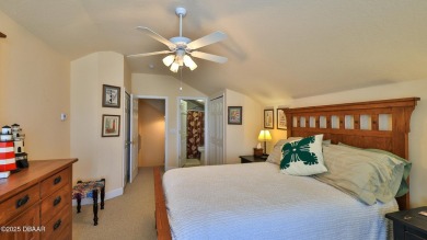 Discover the Florida lifestyle in this pool home-offered on Plantation Bay Golf and Country Club in Florida - for sale on GolfHomes.com, golf home, golf lot