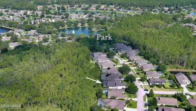 Discover the Florida lifestyle in this pool home-offered on Plantation Bay Golf and Country Club in Florida - for sale on GolfHomes.com, golf home, golf lot