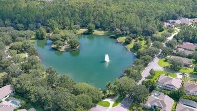 Discover the Florida lifestyle in this pool home-offered on Plantation Bay Golf and Country Club in Florida - for sale on GolfHomes.com, golf home, golf lot