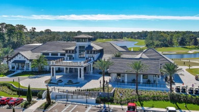 Discover the Florida lifestyle in this pool home-offered on Plantation Bay Golf and Country Club in Florida - for sale on GolfHomes.com, golf home, golf lot