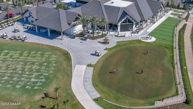 Discover the Florida lifestyle in this pool home-offered on Plantation Bay Golf and Country Club in Florida - for sale on GolfHomes.com, golf home, golf lot