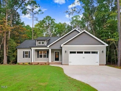 Beautiful custom built home in the highly sought after gated on River Golf and County Club at Lake Royale in North Carolina - for sale on GolfHomes.com, golf home, golf lot