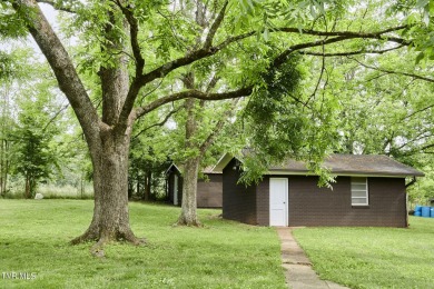 Come see this beautifully remodeled single family solidly built on Smoky Mountain Country Club in Tennessee - for sale on GolfHomes.com, golf home, golf lot