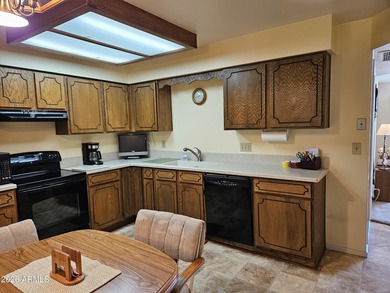 Get Your Winter Visit Started with this Furnished Two Bedroom on Sunland Village East Golf Course in Arizona - for sale on GolfHomes.com, golf home, golf lot