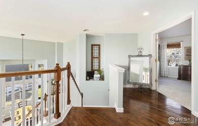 Welcome home to the perfect blend of comfort and Colorado living on Pelican Lakes Golf and Country Club in Colorado - for sale on GolfHomes.com, golf home, golf lot