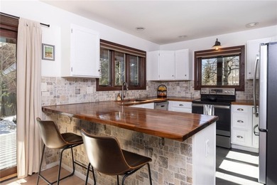 Welcome home to your bright and sunny 3-bedroom, 2-bath mountain on Keystone Ranch Golf Course in Colorado - for sale on GolfHomes.com, golf home, golf lot