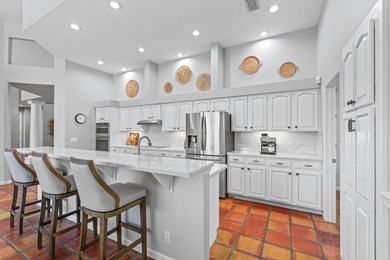 Set on the fairways of Wanderers Golf Course, this beautifully on The Wanderers Club in Florida - for sale on GolfHomes.com, golf home, golf lot