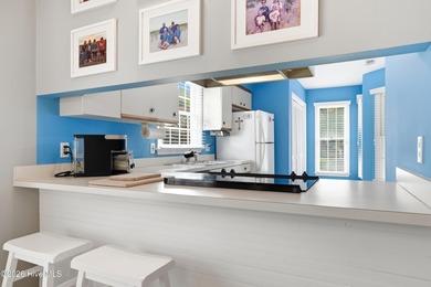 This inviting townhome located in The Woods section of Sea Trail on Sea Trail Golf Resort in North Carolina - for sale on GolfHomes.com, golf home, golf lot