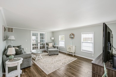 Immaculate and exquisitely updated 2-bedroom, 2-bathroom retreat on Barefoot Bay Golf Course in Florida - for sale on GolfHomes.com, golf home, golf lot