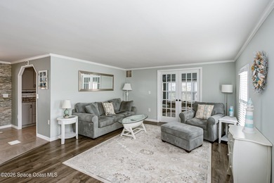 Immaculate and exquisitely updated 2-bedroom, 2-bathroom retreat on Barefoot Bay Golf Course in Florida - for sale on GolfHomes.com, golf home, golf lot