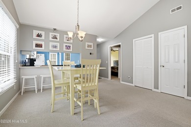 This inviting townhome located in The Woods section of Sea Trail on Sea Trail Golf Resort in North Carolina - for sale on GolfHomes.com, golf home, golf lot