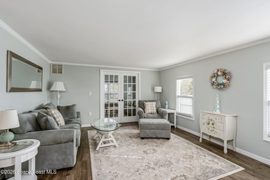 Immaculate and exquisitely updated 2-bedroom, 2-bathroom retreat on Barefoot Bay Golf Course in Florida - for sale on GolfHomes.com, golf home, golf lot