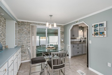 Immaculate and exquisitely updated 2-bedroom, 2-bathroom retreat on Barefoot Bay Golf Course in Florida - for sale on GolfHomes.com, golf home, golf lot