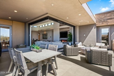 This exquisite upper-level corner residence is south facing and on Desert Mountain Golf Club - Renegade Course in Arizona - for sale on GolfHomes.com, golf home, golf lot