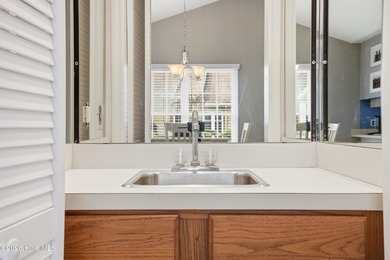 This inviting townhome located in The Woods section of Sea Trail on Sea Trail Golf Resort in North Carolina - for sale on GolfHomes.com, golf home, golf lot