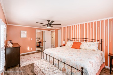 Immaculate and exquisitely updated 2-bedroom, 2-bathroom retreat on Barefoot Bay Golf Course in Florida - for sale on GolfHomes.com, golf home, golf lot