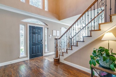 Experience timeless elegance in this Colonial-inspired estate on Lost Creek Golf Course in Texas - for sale on GolfHomes.com, golf home, golf lot