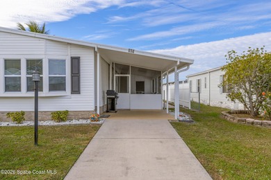 Immaculate and exquisitely updated 2-bedroom, 2-bathroom retreat on Barefoot Bay Golf Course in Florida - for sale on GolfHomes.com, golf home, golf lot