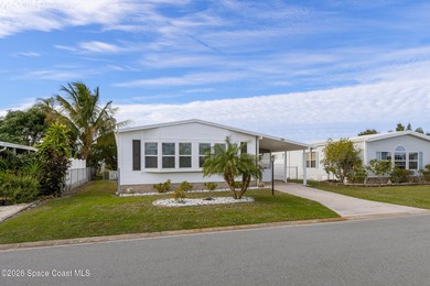Immaculate and exquisitely updated 2-bedroom, 2-bathroom retreat on Barefoot Bay Golf Course in Florida - for sale on GolfHomes.com, golf home, golf lot