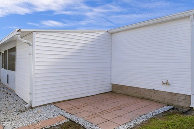 Immaculate and exquisitely updated 2-bedroom, 2-bathroom retreat on Barefoot Bay Golf Course in Florida - for sale on GolfHomes.com, golf home, golf lot