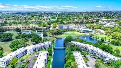 Enjoy peaceful golf course views from your screened patio at on Colony West Country Club in Florida - for sale on GolfHomes.com, golf home, golf lot