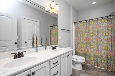 Curb appeal, an open layout, generous sized rooms, walk-in on Heritage Golf Club in North Carolina - for sale on GolfHomes.com, golf home, golf lot