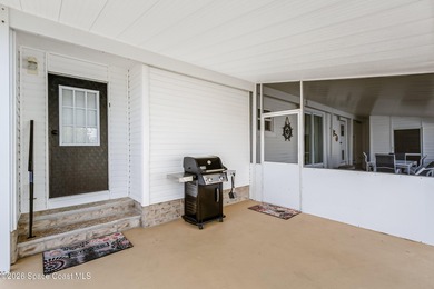 Immaculate and exquisitely updated 2-bedroom, 2-bathroom retreat on Barefoot Bay Golf Course in Florida - for sale on GolfHomes.com, golf home, golf lot