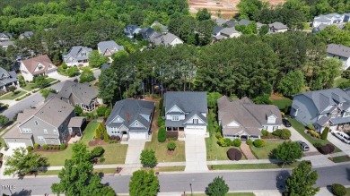 Curb appeal, an open layout, generous sized rooms, walk-in on Heritage Golf Club in North Carolina - for sale on GolfHomes.com, golf home, golf lot