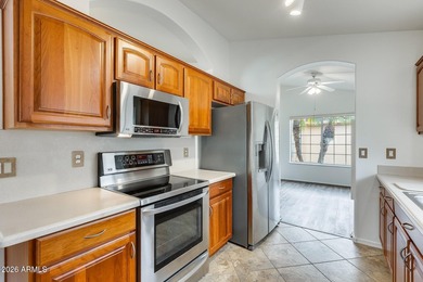 Square footage includes enclosed House (1287) sun room (327)and on Sun Village Golf Course in Arizona - for sale on GolfHomes.com, golf home, golf lot