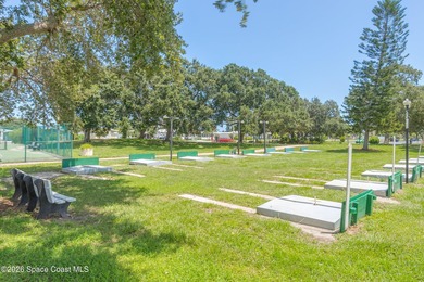 Immaculate and exquisitely updated 2-bedroom, 2-bathroom retreat on Barefoot Bay Golf Course in Florida - for sale on GolfHomes.com, golf home, golf lot