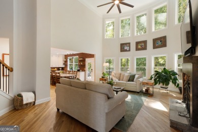 Price to move, this custom-built home sits on a roundabout on Hampton Golf Village in Georgia - for sale on GolfHomes.com, golf home, golf lot