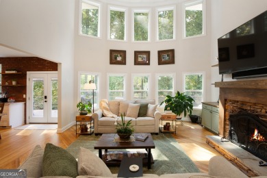 Price to move, this custom-built home sits on a roundabout on Hampton Golf Village in Georgia - for sale on GolfHomes.com, golf home, golf lot
