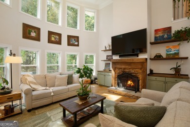 Price to move, this custom-built home sits on a roundabout on Hampton Golf Village in Georgia - for sale on GolfHomes.com, golf home, golf lot